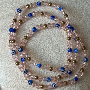 Pink Beaded Evil Eye Bracelet Set with Blue and Gold Accents